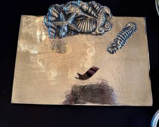 metal cheese board and knife 