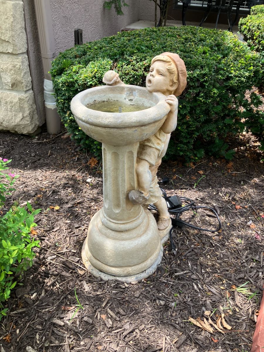 Concrete fountain with pump