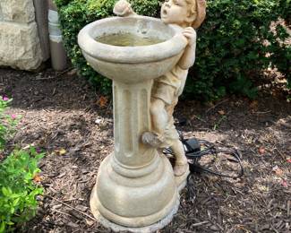 Concrete fountain with pump