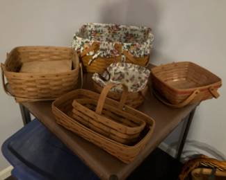 Many Longaberger baskets