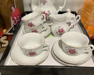 Porcelain doll dishes