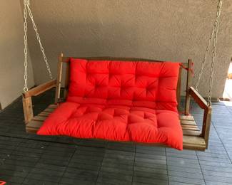 Wooden porch swing