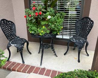 Cast aluminum table w 2 chairs
