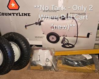 Never used, pull behind tractor cart, unassembled