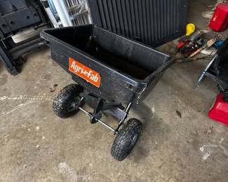 Tow behind broadcast spreader