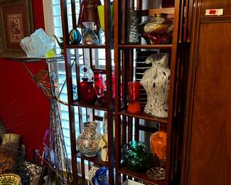 book shelves, figurines, glassware