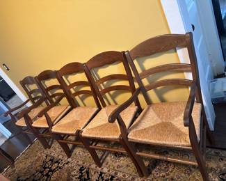 Fruitwood (?) and rush dining chairs. Three captains and six chairs. 9 total