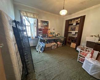 Vintage mattress and box spring, 1969 cradle, vintage doll bed, doll high chair, child's potty chair (1972), vintage toddler's walker, Singer sewing machine, doll clothes, doll houses (1 assembled, 2 still in the box), doll beds, toy chests (2), and sewing supplies