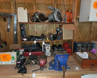Vintage saws, clamps, staplers, and compressor tools