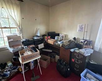 Desk, vintage file cabinet, some electronics, vintage adding machine, 1980s video recorder