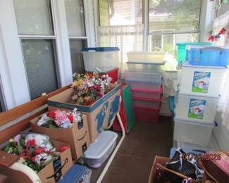 storage tubs, silk flowers, glider
