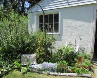 trellis, shepherds hooks, plastic fencing, metal deer decor