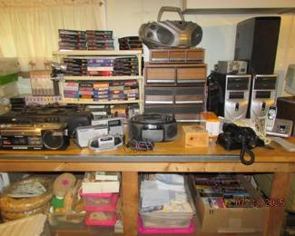 VHS tapes, cassettes, craft supplies, radios, phones, computers