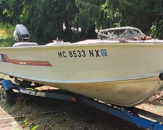 monark fishing boat with trailer and 25 hp mercury