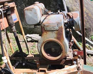 Wisconsin motor attached to a cement cutter. Available for viewing/presale.
