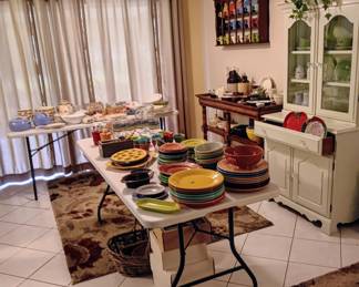 Lots of Fiestaware dishes, Hall dishes, whiskey jugs, Jadeite fire king dishes, buffet/entry table,