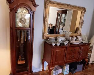 Mirror, buffet, homer Laughlin dishes, Waterford crystal vase, huge set of fine china in perfect condition, Howard Miller grandfather clock