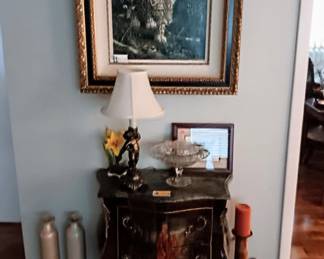Art work, candle sticks, tables