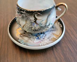 Morige Dragon-ware. Look for it's ghostly image of a Geisha. Lithophane art often supplied a type of Oriental erotica popular in the west prior up to WW2. This example shows a Geisha with a peaceful facial expression.