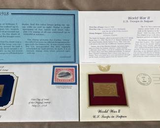22kt gold replica stamps of 1918 Air Mail Issue Stamp and WorldWar II US Troops in Saipan stamp.