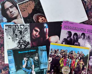 Jefferson Airplane, James Taylor, and Beatles LPs, including the White Album