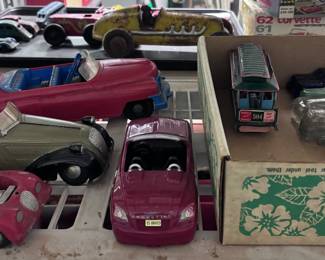 Some toy cars in original boxes
