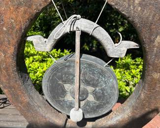 Decorative Outdoor Gong Within Large Circular Stone or Concrete Frame