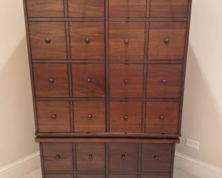 Apothecary-style entertainment cabinet 64"h x 28"w x 27"d