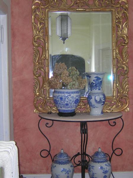 LARGE DECORATOR MIRROR, BLUE AND WHITE PORCELAIN PIECES, ONE OF TWO MARBLE TOP CONSOLE TABLES