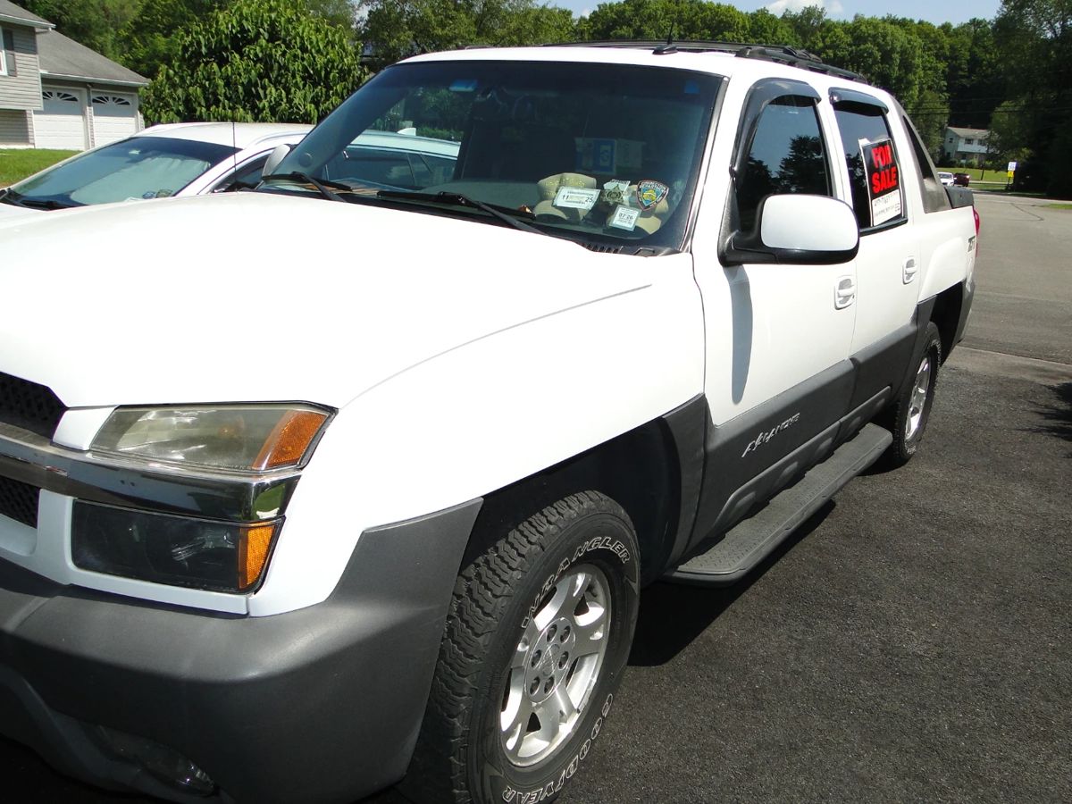 2003 Chevrolet Avalanche 78,000 original miles.