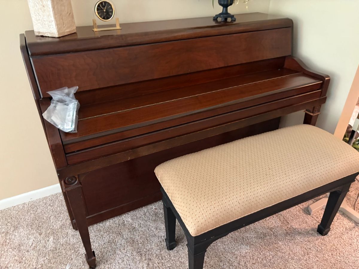 . . . a beautiful Grinnell Brothers upright piano