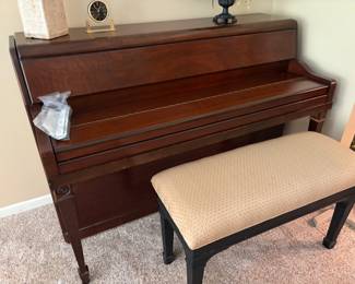 . . . a beautiful Grinnell Brothers upright piano