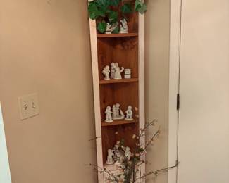 . . . cute open curio filled with Snow Babies
