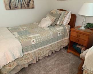 . . . twin bed with nice bedding