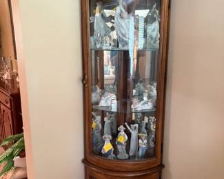 . . . cute corner curio stuffed with Lladros