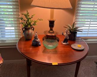 . . . beautiful side table with brass lamp and treasures