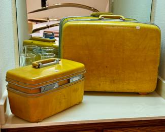 Vintage mustard yellow luggage 