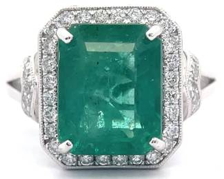 5.52 Carat Natural Emerald & Pavé Diamond Halo Ring in Platinum