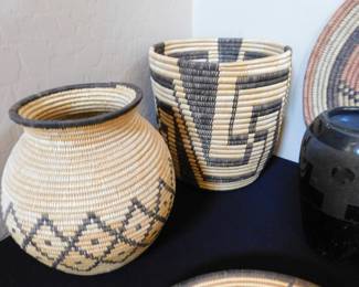 Basket on the left is Pima, fine coil weave of willow and devils claw over cattail reed. Basket on the right is Papago, Large fine coil weave of split yucca and devils claw over bundled bear grass.