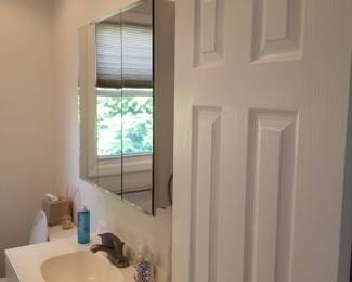 Mirrored medicine cabinet