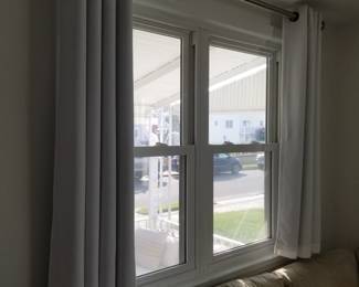 Curtains, rods; blinds by Levolor.