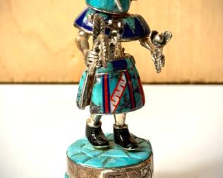 Close up of Inlaid stones over Sterling silver figures 6-8 inches tall