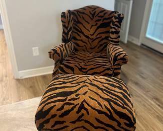 Tiger chair and ottoman. Ottoman also serves as a storage chest