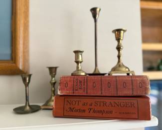 antique books, brass candlesticks