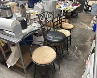4 CUSHIONED SWIVEL CHAIRS