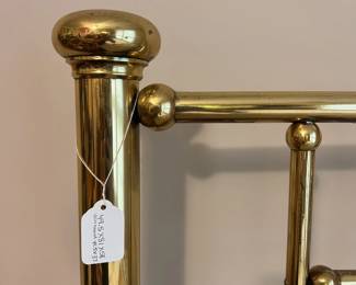C18 - $100. Brass Bed Frame. Measures 49.5" wide x 81" long x Headboard 58" tall x Footboard 37" tall.