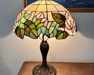 C5 - $60. Tiffany Style Table Lamp with Rose design. Measures 23" tall x 16" wide shade.