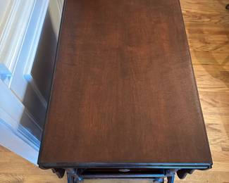 D57- $225. Vanleigh New York, Mahogany Tea-cart with Glass tray. Measures 28" wide x 18.35" deep x 28.25" tall. Handle folds down when not in use.