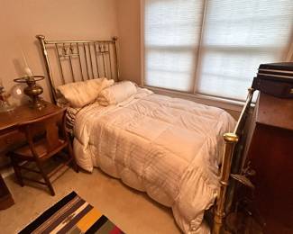 C18 - $100. Brass Bed Frame. Measures 49.5" wide x 81" long x Headboard 58" tall x Footboard 37" tall.