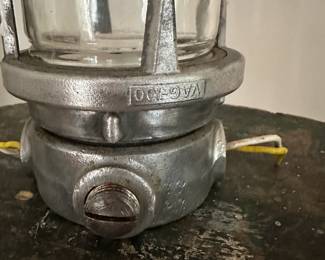 F6 - $25. Vintage Killark VAG-100 Explosion Proof Lighting Fixture Cage. Measures 10" tall.